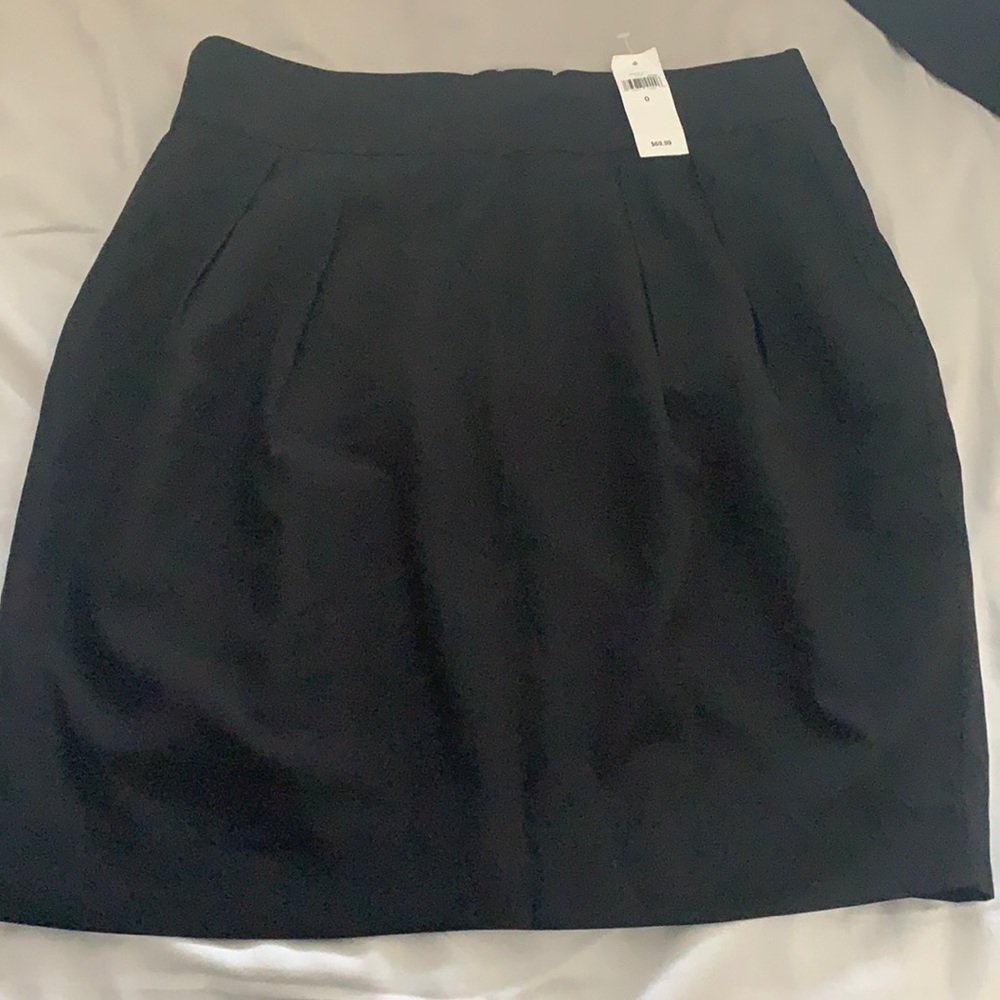 Stunning pleated black skirt. Unworn with tags